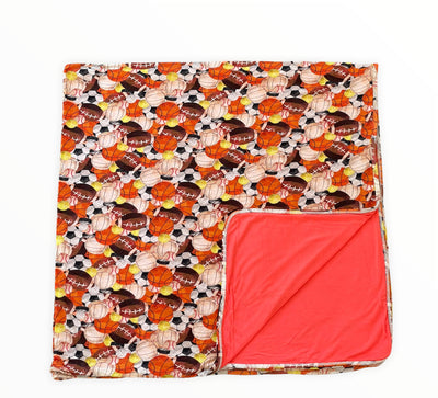 Kobe’s Snug-a-muffle™  Reversible Blanket